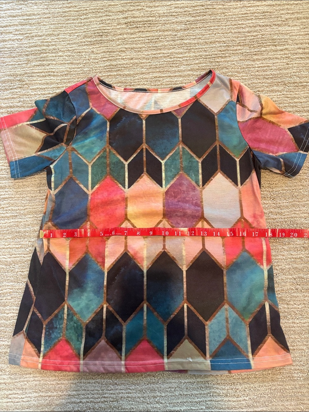 Multicolor Geometric Print Short Sleeve Top. Fits small to med. Worn once.